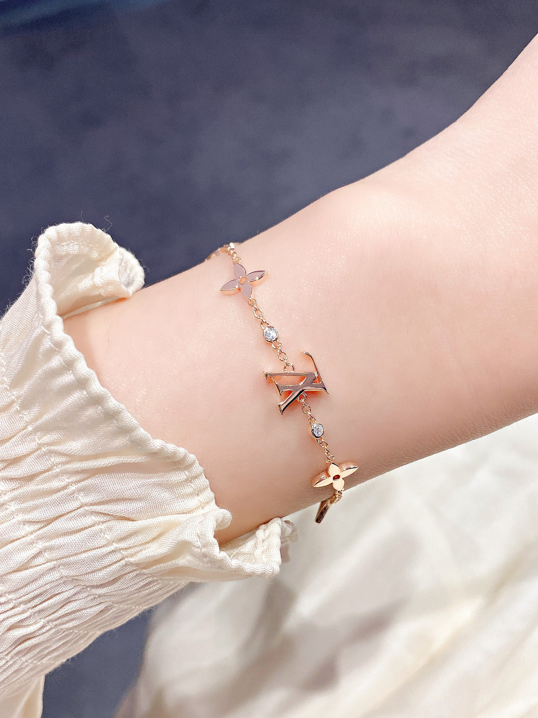 TimiSTAR AND SUN 7 MOTIFS GOLD BRACELET