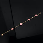 TimiSTAR AND SUN 4 MOTIF PINK MOP PINK GOLD BRACELET